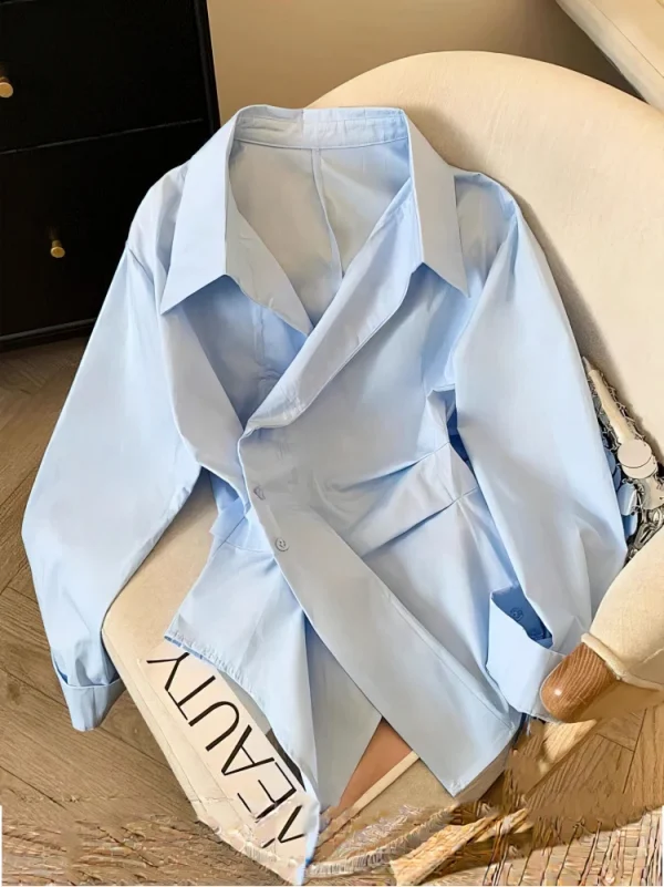 S8072b089e91948f892bd25607997f960l.webp بلوزة كم طويل أنيقة